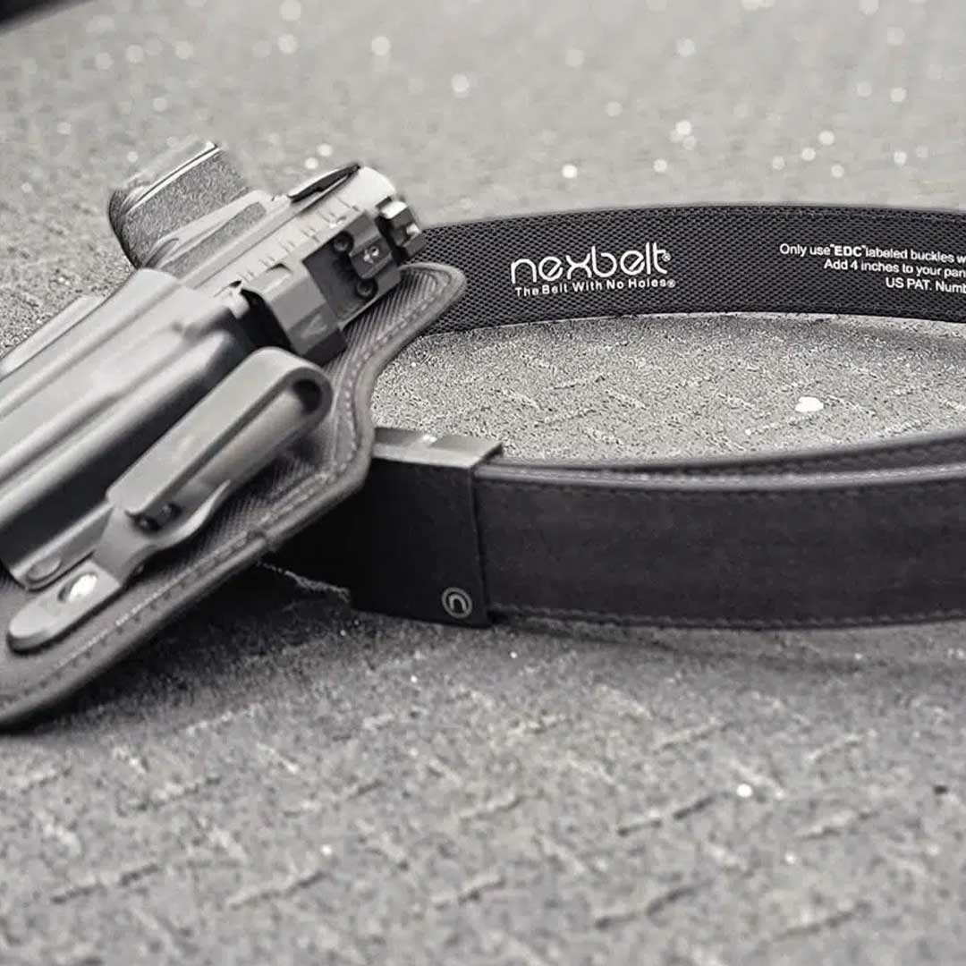A nexbelt with a gun in the holster